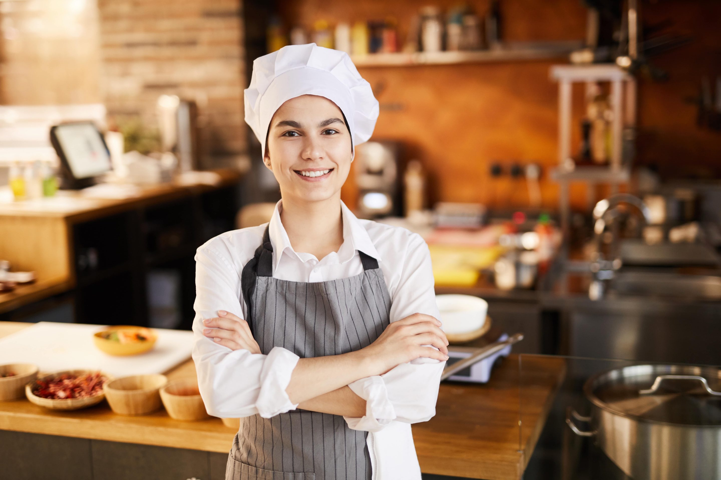 VEVS Global - Skilled Migration Perth and Australia - Apprentice Chef Smiling A smiling apprentice chef, happy because Australia recognises the importance of attracting skilled professionals
