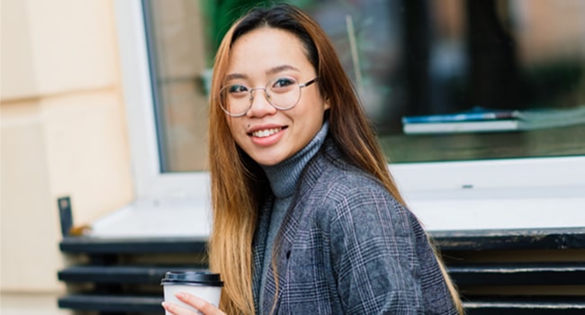 VEVS Global - Graduate Visas Australia - Student with coffee An Australian student keen to remain in Australia at the completion of their studies to continue living the Australian life a little longer and seek out work visas to remain in the country.