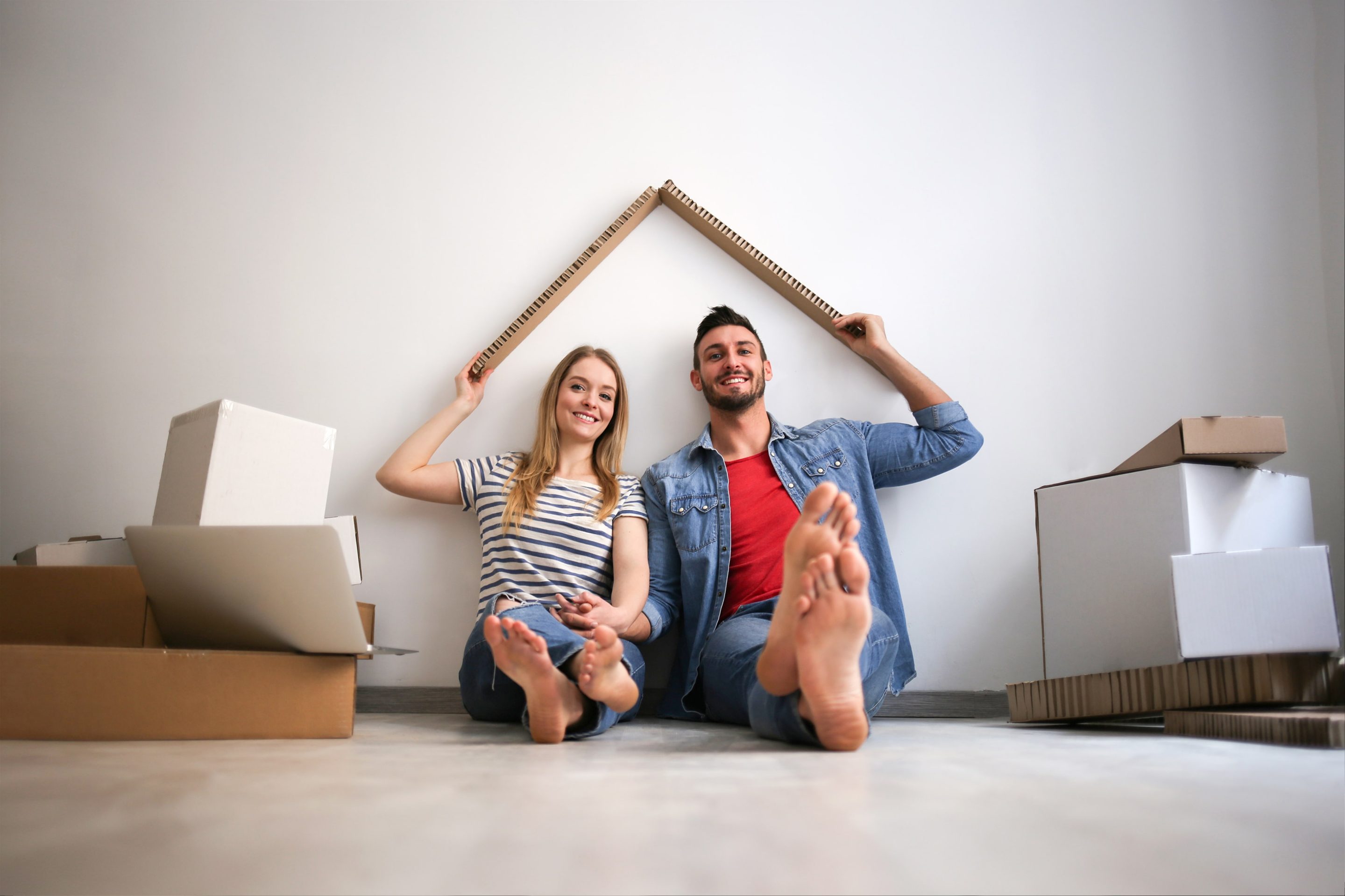 VEVS Global - Australian Partner Visa Services in Perth - A couple celebrating a new home A couple celebrates the purchase of a new home after being granted a partner visa