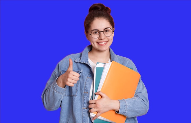 Australian International Student giving a thumbs up holding a yellow clipboard.