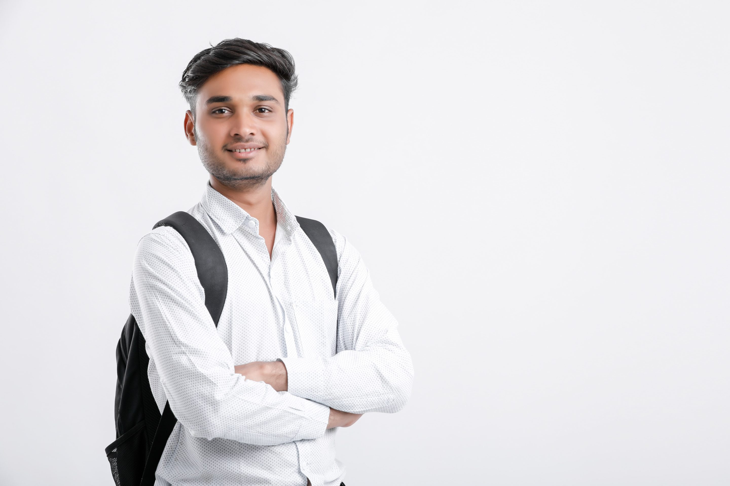 A young student smiling after being granted a student visa thanks to the assistance from VEVS Global